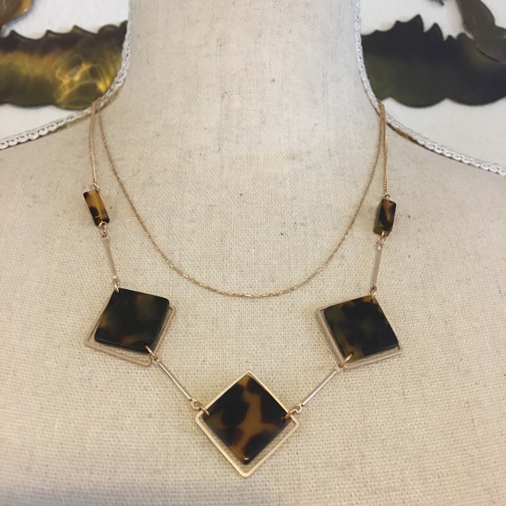 Double strand gold tone faux tortoise necklace
